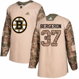 Men's Adidas Boston Bruins #37 Patrice Bergeron Authentic Camo Veterans Day Practice NHL Jersey